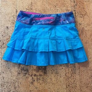 Ivivva by Lululemon “Set the Pace” blue pleated Skirt with Pink Highlights